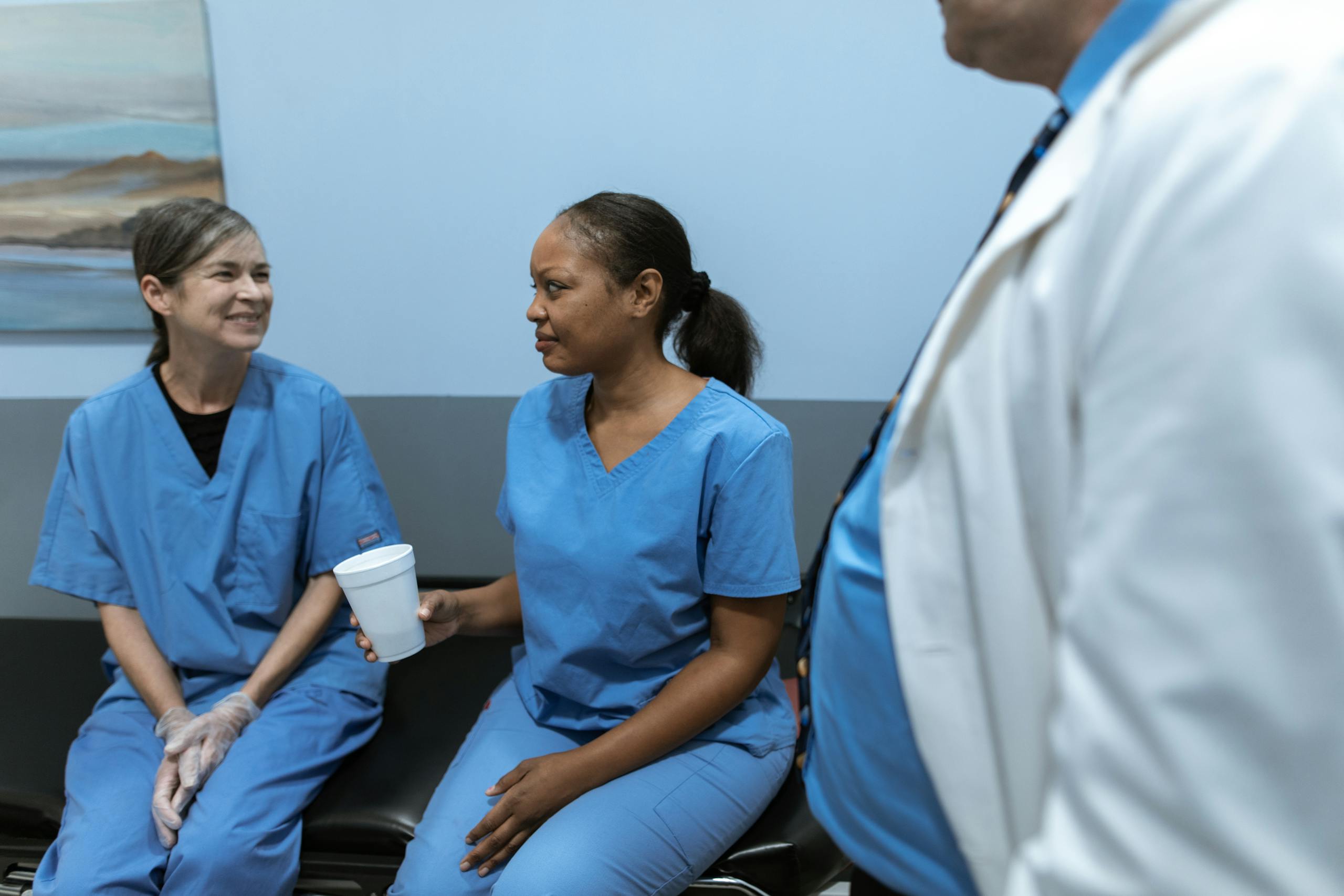 Nurses Talking while Sitting