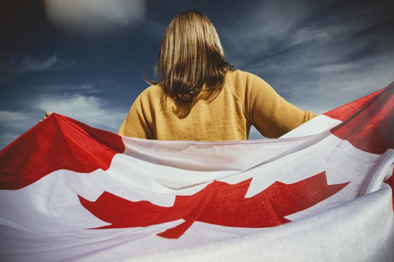 Woman Holding Canada Flag