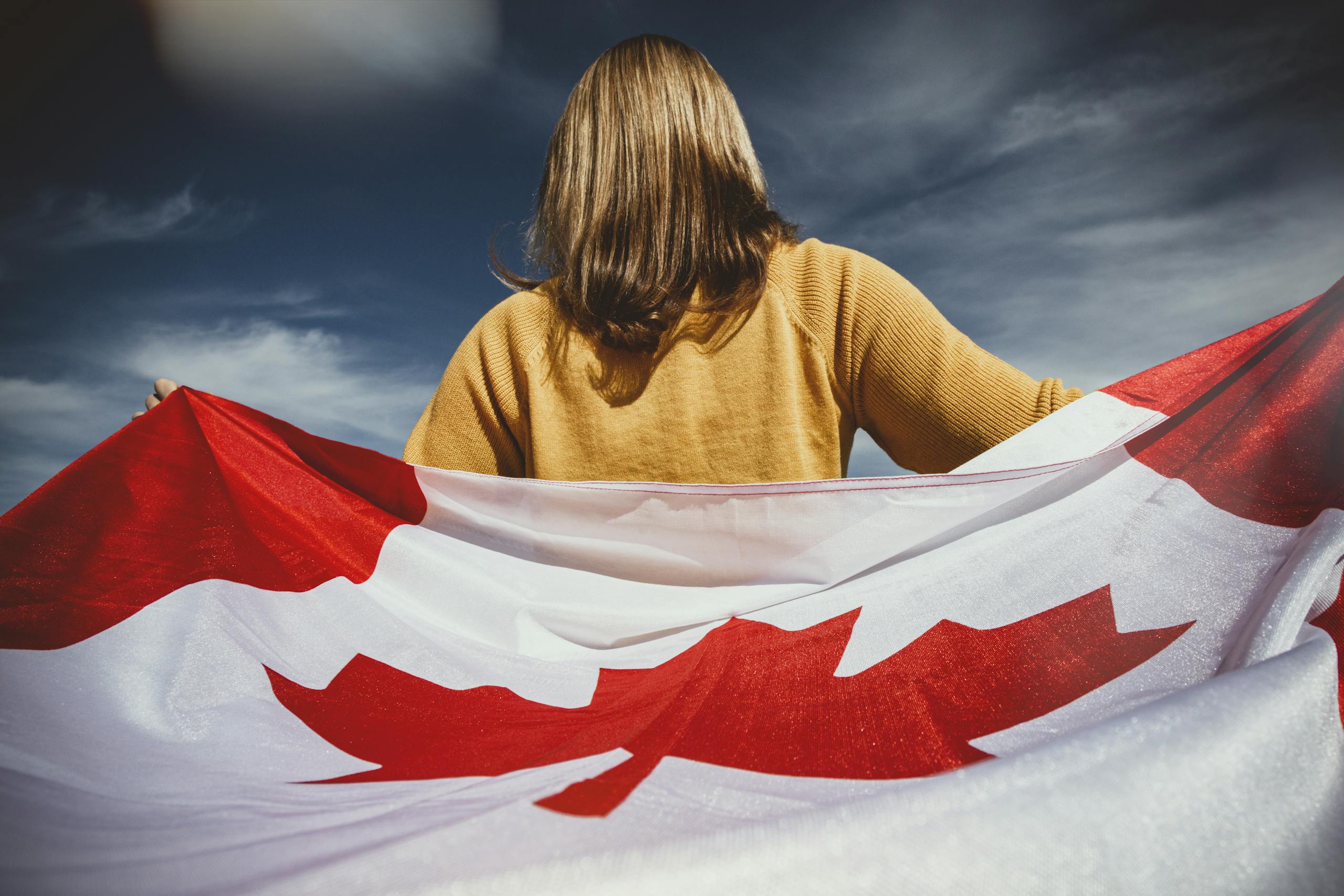 Woman Holding Canada Flag