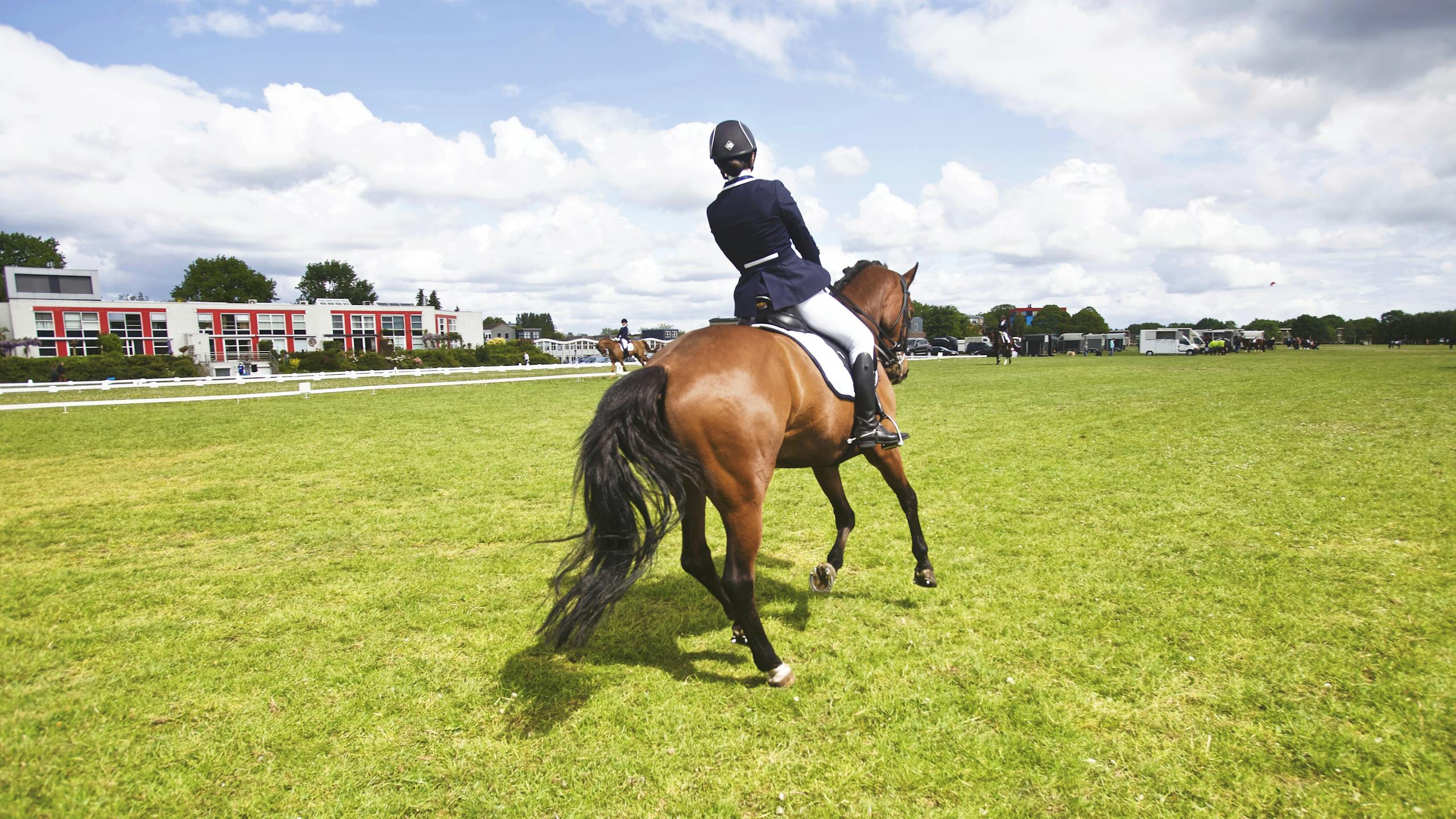 Person Riding Horse at the Field during Day